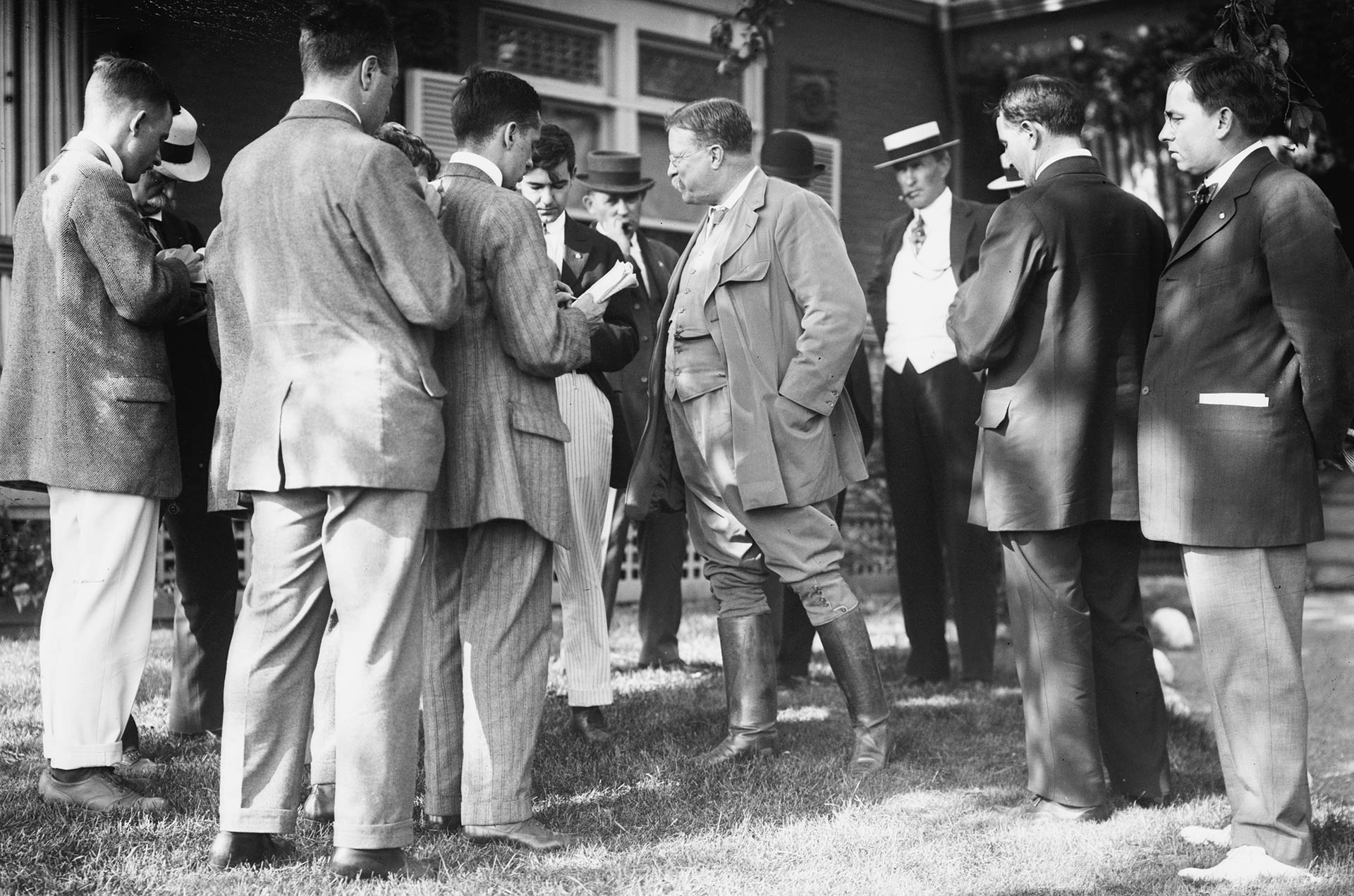 Theodore Roosevelt speaks to reporters at his Sagamore Hill home